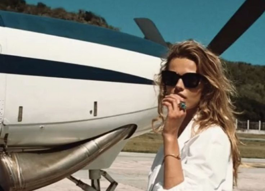 Woman standing near plane